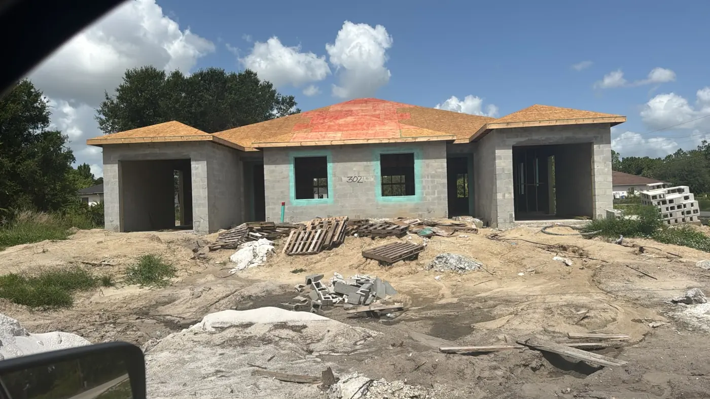 Duplex under construction with roof sheathing installed